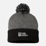 Charcoal and black pom pom beanie with fold-over cuff, embroidered Stark Create logo, and soft ribbed knit design